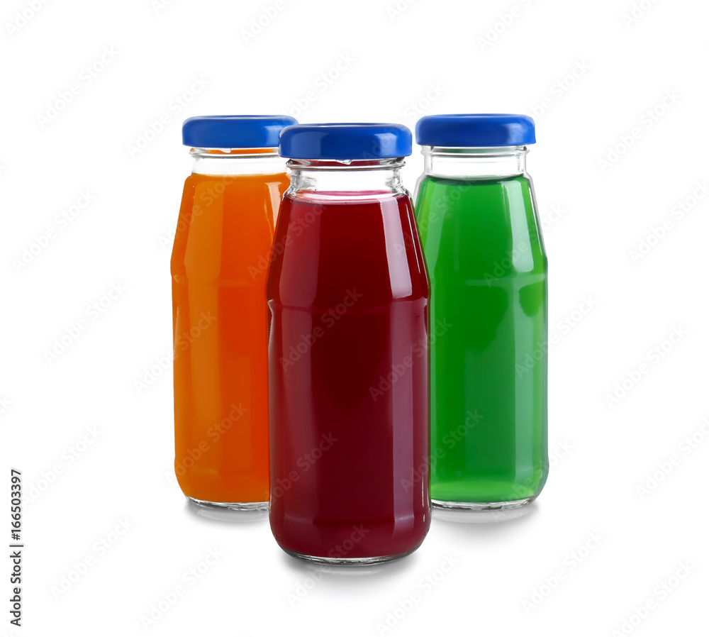 Different juices in bottles on white background Different juices in bottles on white background