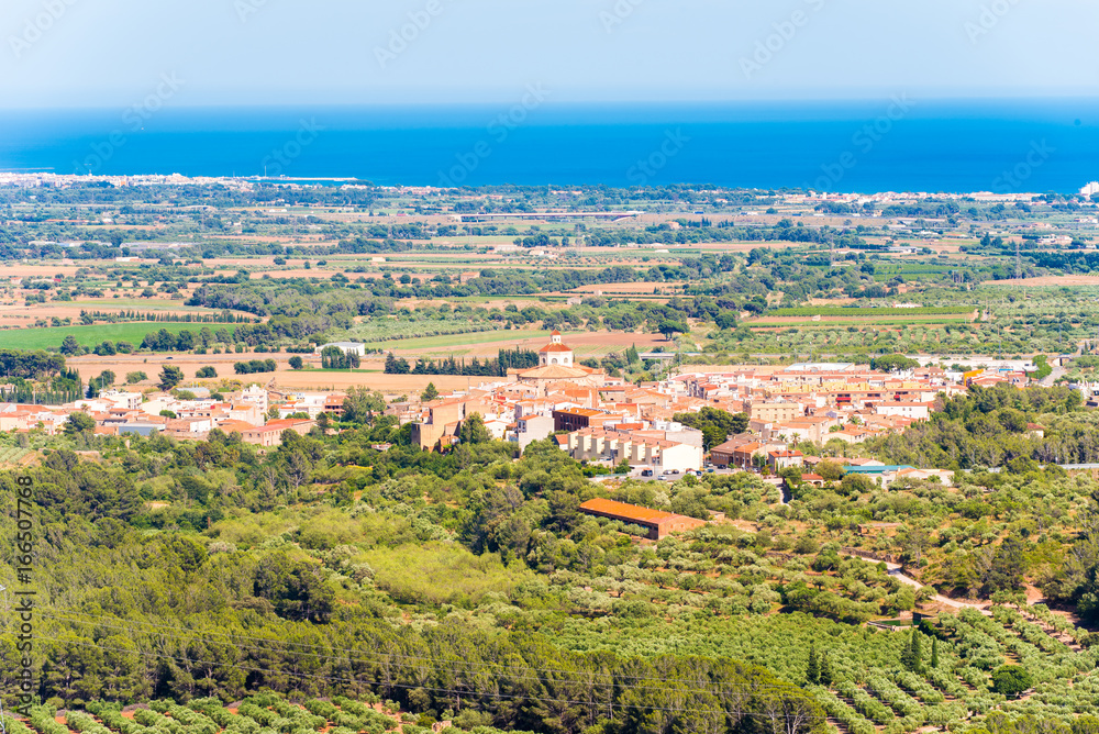 Landscape, view of old Spanish town and valley , Montbrio del Camp, Tarragona, Catalunya, Spain. Copy space for text.