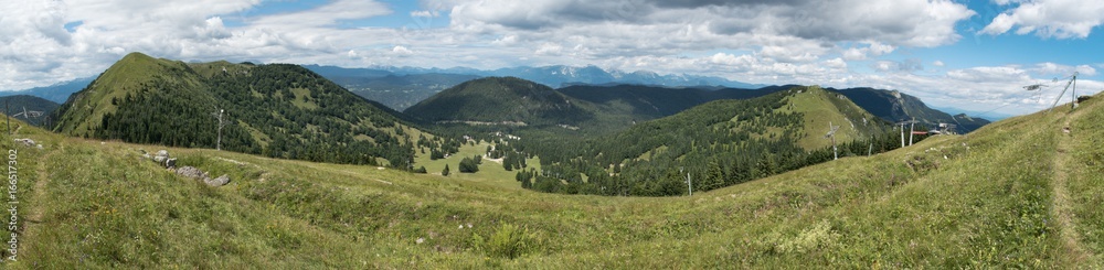 panorama of Soriška planina below of summit of Lajnar in Julian Alps in Slovenia