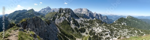 panorama with Triglav and Rjavina from the summit of Visevnik in Triglav national park in Julian Alps in Slovenia