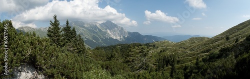 panorama with Krn mountain from the hillside of Krasji vrh in Julian Alps in Slovenia