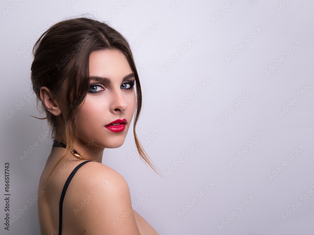 Fashionable portrait of a girl model. Fashion, accessories, evening makeup. Fashionable portrait of a girl model. Fashion, accessories, evening makeup.