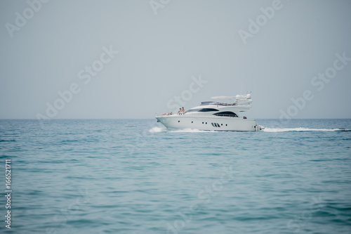 luxury yacht in ocean swimming on waves © F8  \ Suport Ukraine