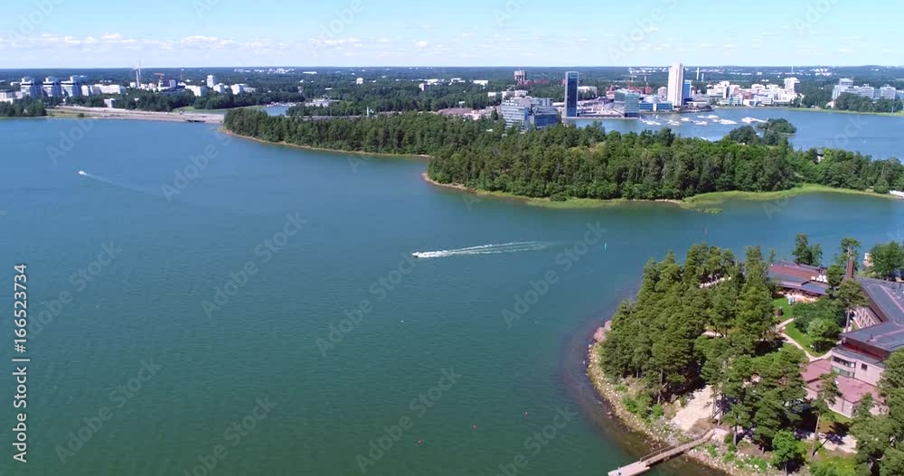 Keilaniemi, Cinema 4k aerial view of boats a boat leaving karhusalmi out to the baltic sea, just outside helsinki, on a sunny day, in Espoo, Uusimaa, Finland Keilaniemi, Cinema 4k aerial view of boats a boat leaving karhusalmi out to the baltic sea, just outside helsinki, on a sunny day, in Espoo, Uusimaa, Finland