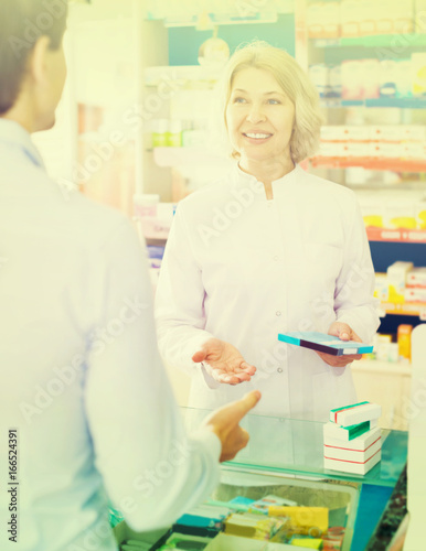 pharmaceutist  helping customer