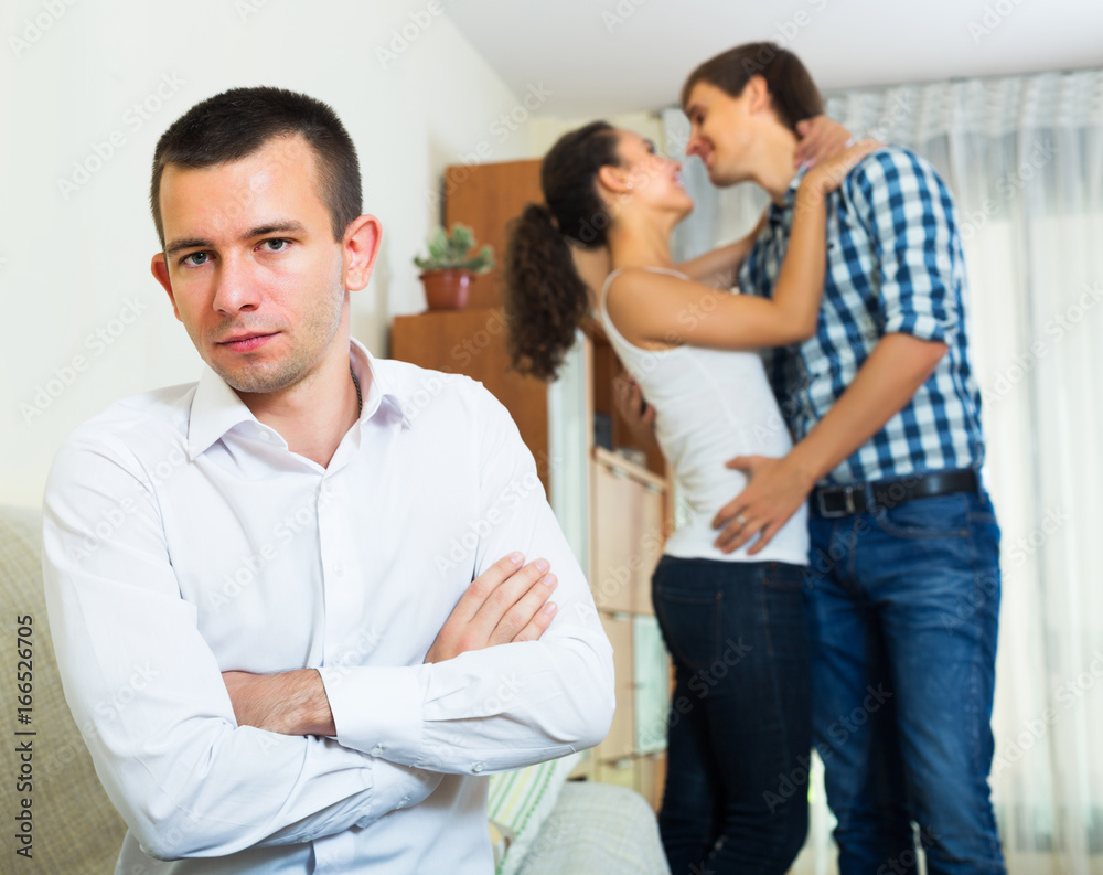 Fototapeta premium Ex-lover watching girlfriend leaving him