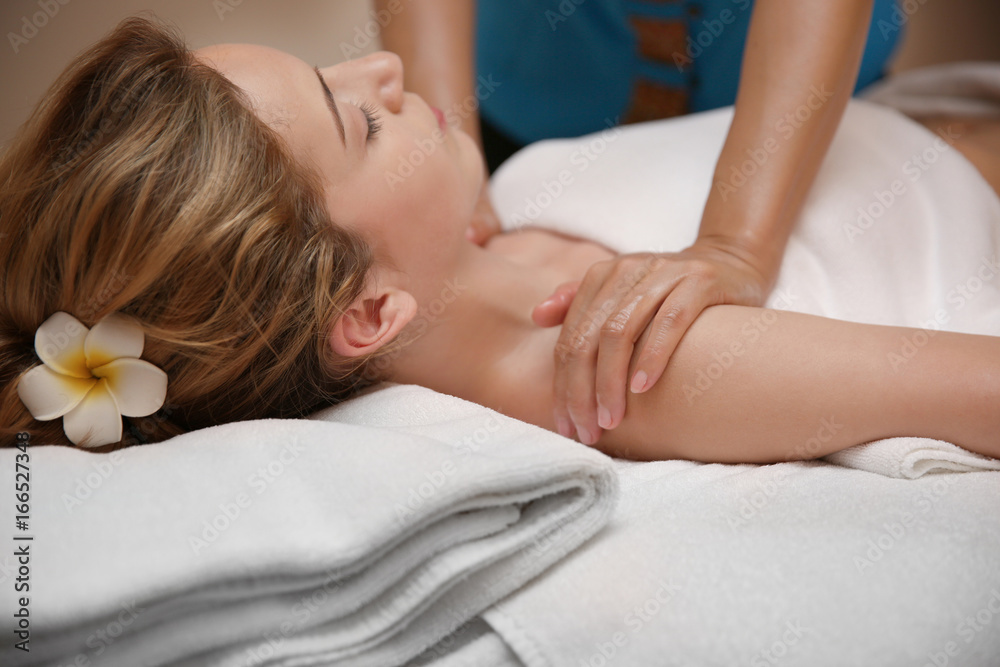 Young woman having massage in spa salon, closeup view Young woman having massage in spa salon, closeup view