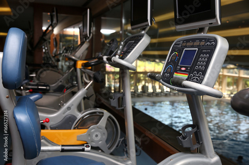Modern fitness machines in gym