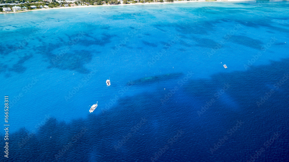 Dive boats around the wreck of the USS Kittiwake on Grand Cayman