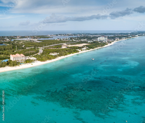 Fototapeta Naklejka Na Ścianę i Meble -  Aerial view of the tropical coral reef and seven mile beach of Grand Cayman island