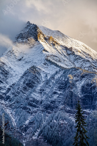 Fresh snow on a mountain peak in the Canadian Rockies, British C