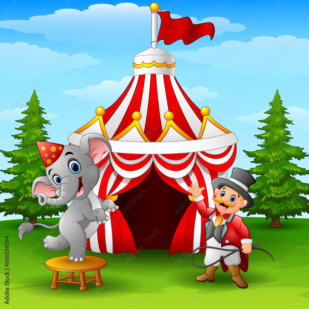 Obraz premium Circus elephant and tamer on the circus tent background