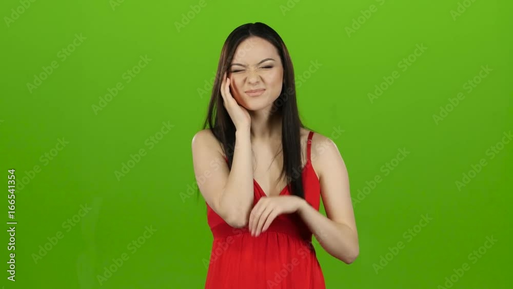 Girl has a headache, she is suffering from migraines. Green screen Girl has a headache, she is suffering from migraines. Green screen