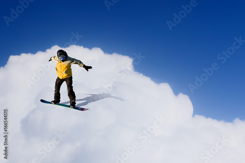 Snowboarder making jump