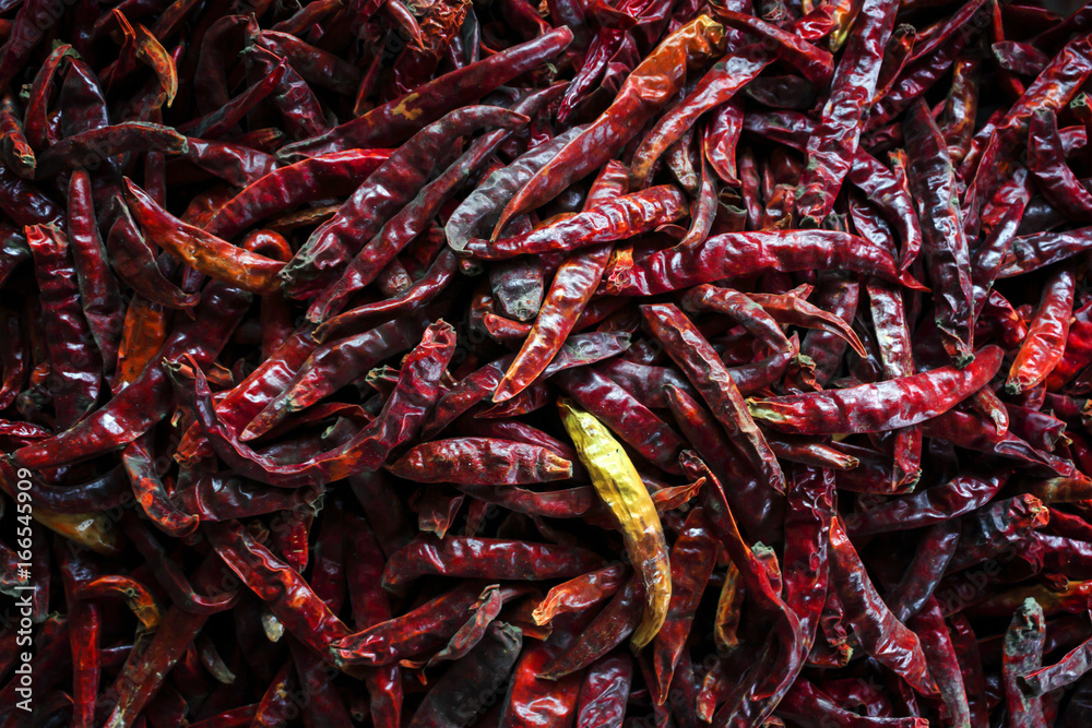 Fototapeta premium red chilies pepper with soft-focus and over light in the background