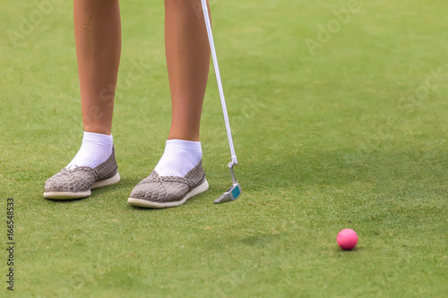Low section of female golf player