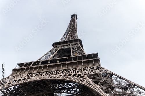 Paris, France - April 29, 2016: Eiffel Tower. Constructed from 1887–89 as the entrance to the 1889 World's Fair, it is a wrought iron lattice tower on the Champ de Mars in Paris