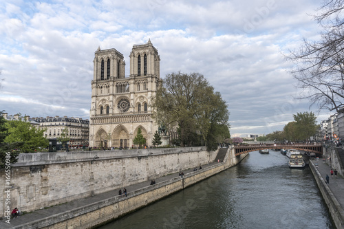 Paris, France - April 28, 2016: panoramic view of Paris and Notre-Dame Cathedral. Notre-Dame de Paris is a medieval Catholic cathedral on the Ile de la Cité in the fourth arrondissement of Paris