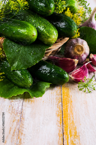 Raw cucumber with spices photo