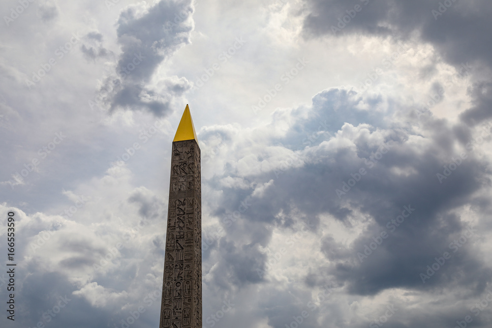 Stormy clouds behind Luxor Obelisk in Paris