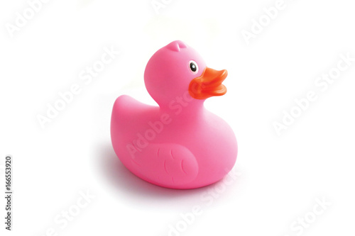 Photo depicting a pink rubber duck, isolated on a white background. Children bath toy rubber ducky. Macro, close up view.