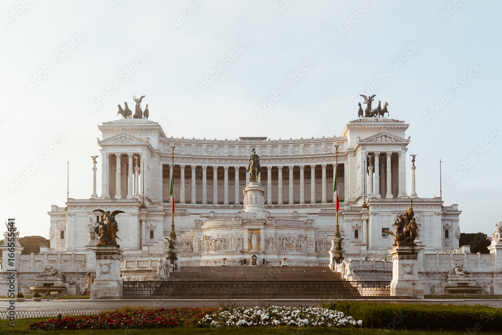 Beautiful Altar Of The Fatherland (Altare della Patria, known as the national Monument to Victor Emmanuel II or II Vittoriano ) at sunset.Famous Roman landmark. Piazza Venezia. Rome. Italy. Europe.