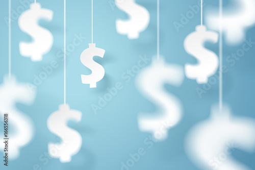 Paper art of dollar sign hanging on the sky