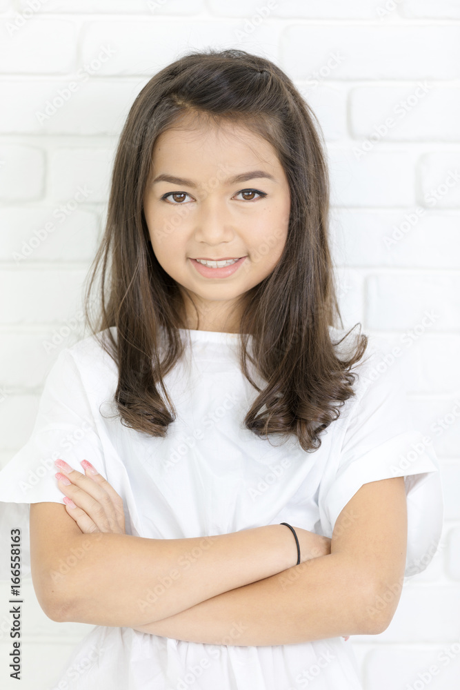 Headshot Portrait of happy cute girl smiling looking at camera. Headshot Portrait of happy cute girl smiling looking at camera.