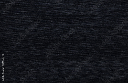 Black background, denim jeans background. Jeans texture, fabric.