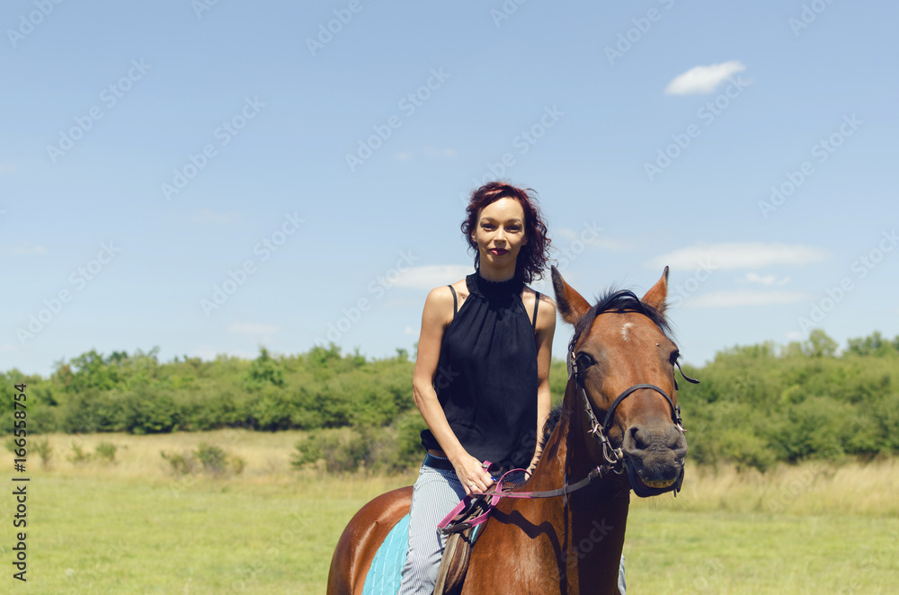 Fototapeta premium woman riding bay