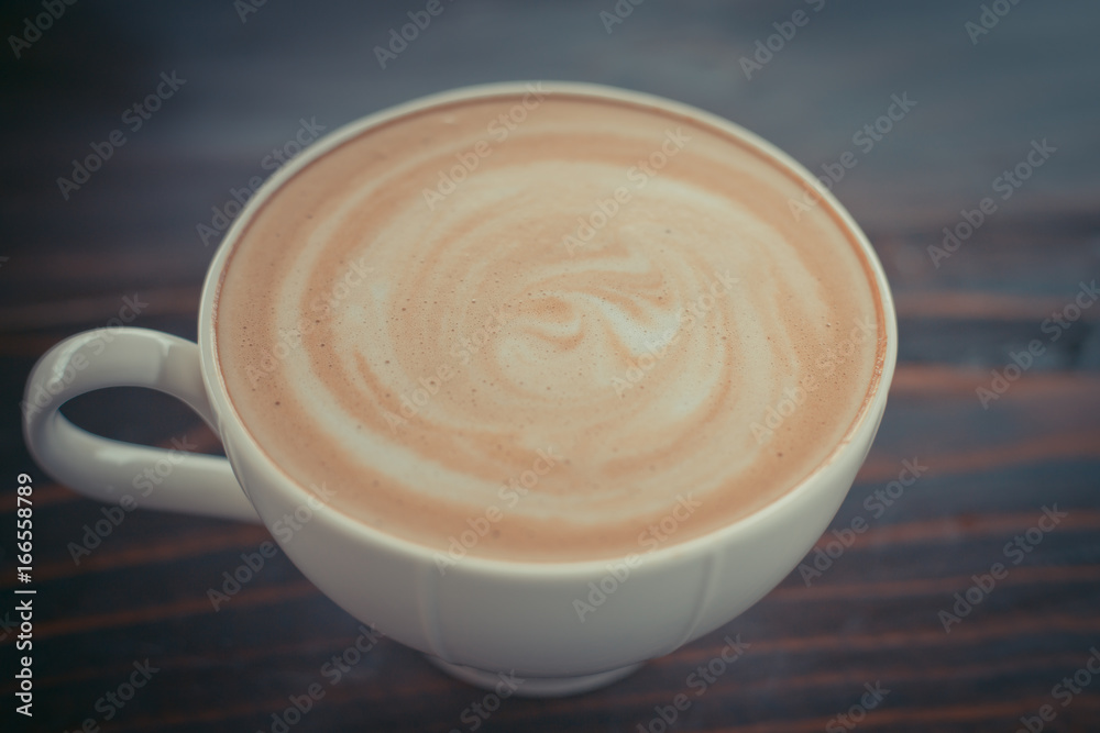 Beautiful late coffee on black wood background. Beautiful late coffee on black wood background.