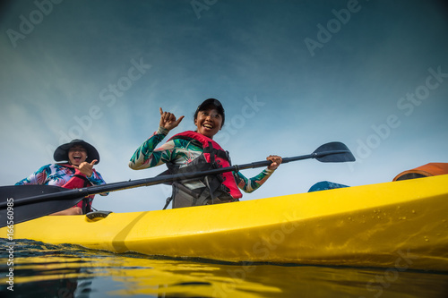 Two hawaiian girls on kayak