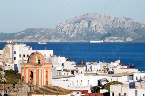 Village of Tarifa, located in the Strait of Gibraltar. In the background can be observed Morocco. photo