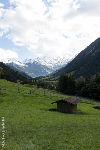 A building is Austrian Alps near snowy mountains