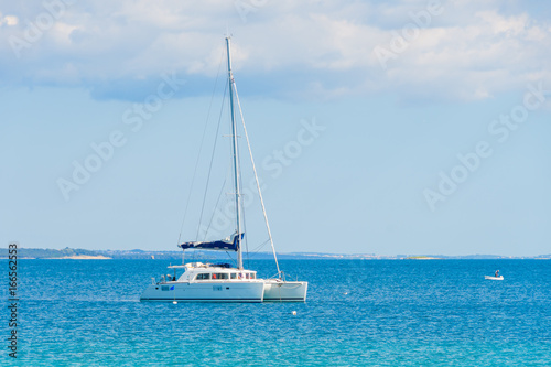 Luxury sailing catamaran in open sea