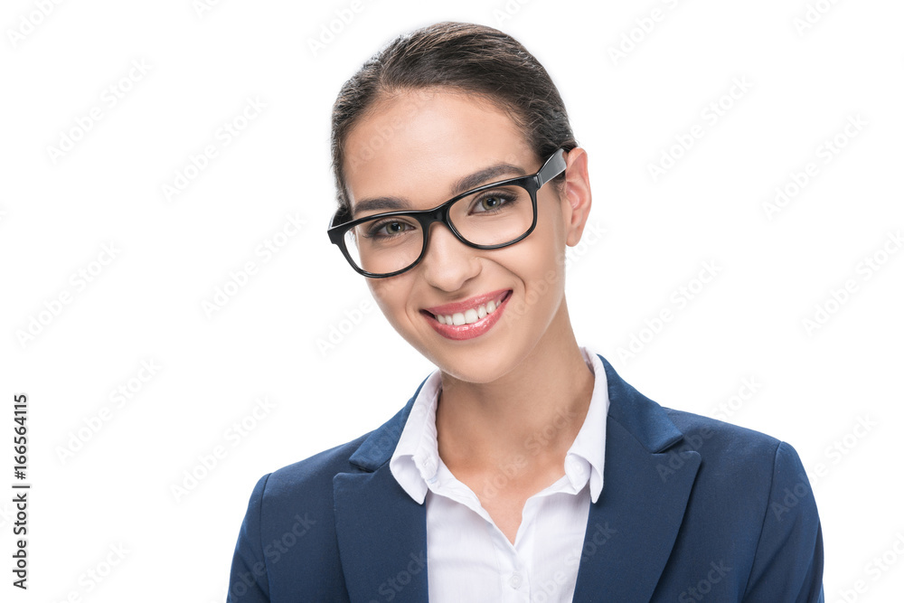 beautiful businesswoman in grey suit and eyeglasses looking at camera, isolated on white