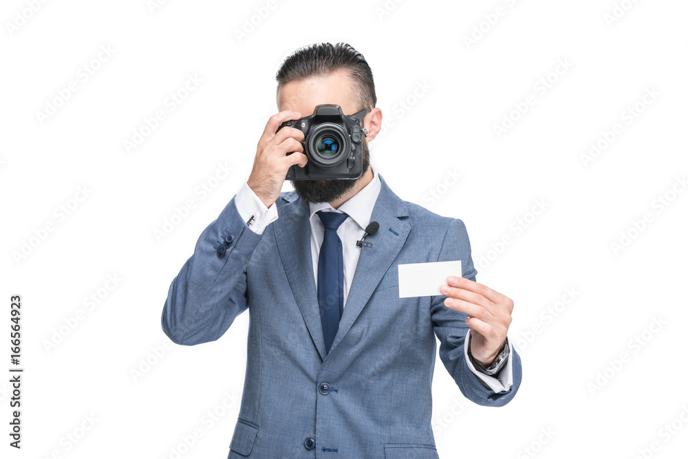 businessman in grey suit taking photo of empty card, isolated on white businessman in grey suit taking photo of empty card, isolated on white
