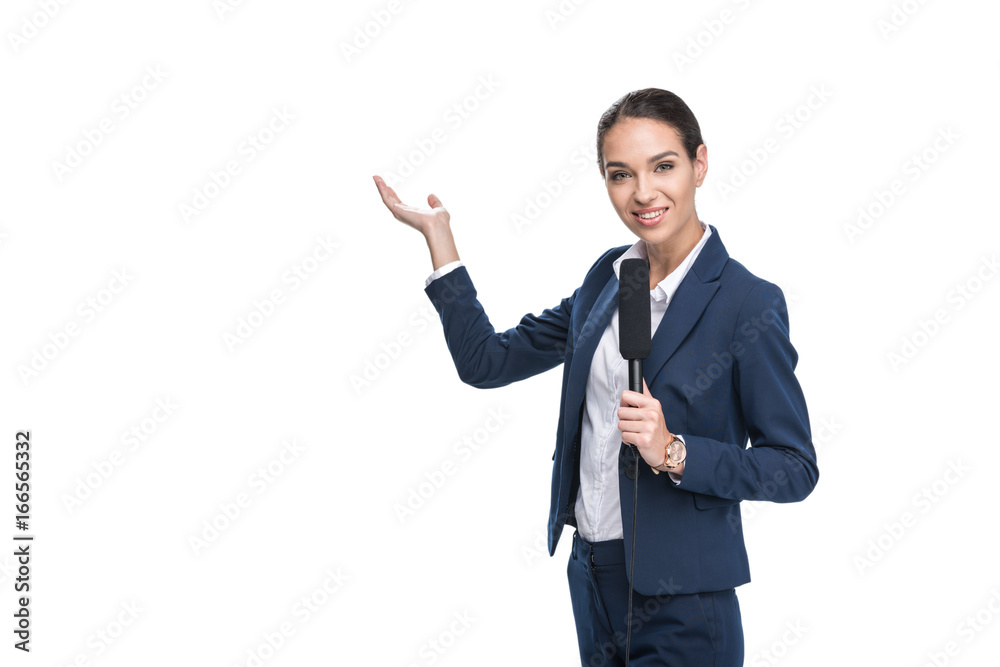 smiling female newscaster with microphone presenting something, isolated on white smiling female newscaster with microphone presenting something, isolated on white
