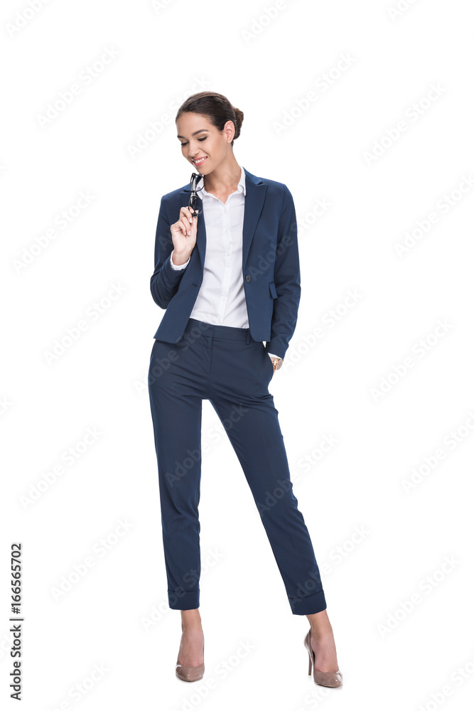 beautiful smiling businesswoman with eyeglasses posing in suit, isolated on white beautiful smiling businesswoman with eyeglasses posing in suit, isolated on white