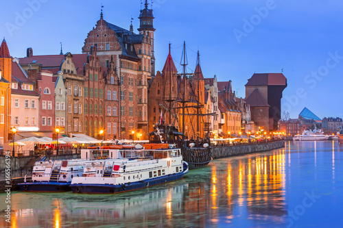 Historic port crane over Motlawa river in Gdansk at night, Poland