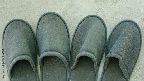Quadro su tela Close-up of bedroom slippers on floor