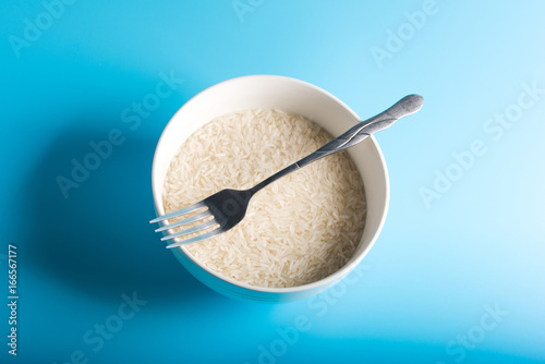 fork on the bowl of rice 