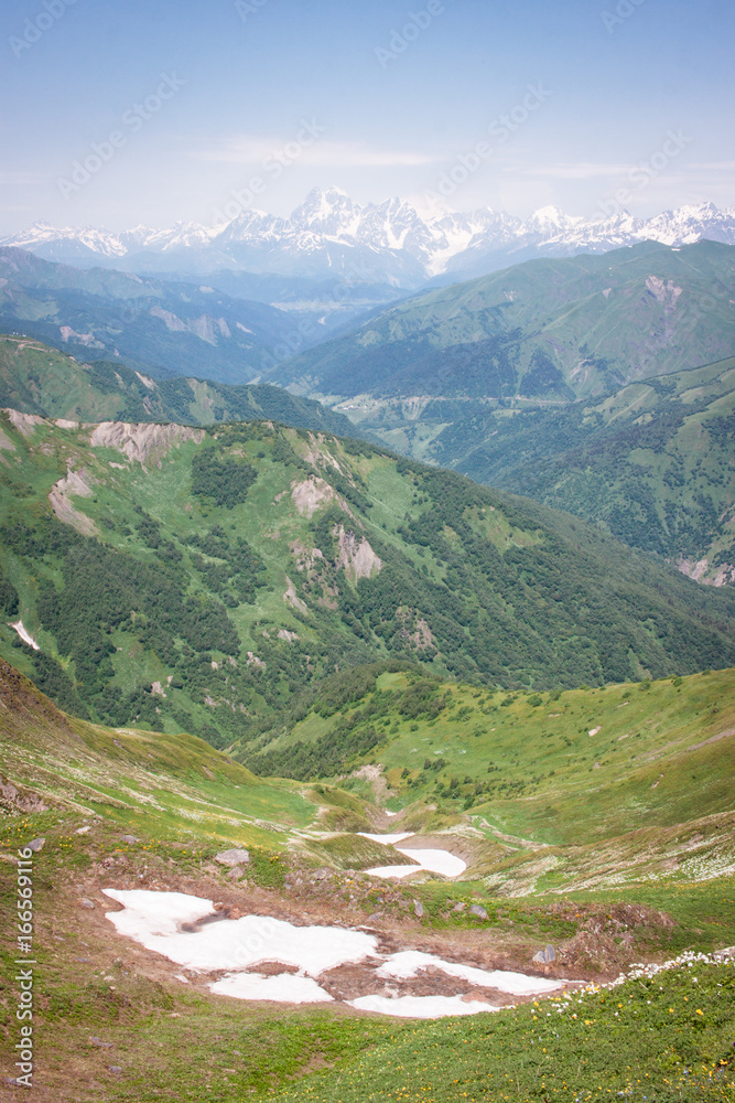 Trekking the Caucasus from Ushguli to Mestia and via Latpari pass to Chvelpi. Greater Caucasus, Svaneti region, Georgia.