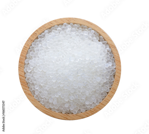 Silica gel in wood on white background photo