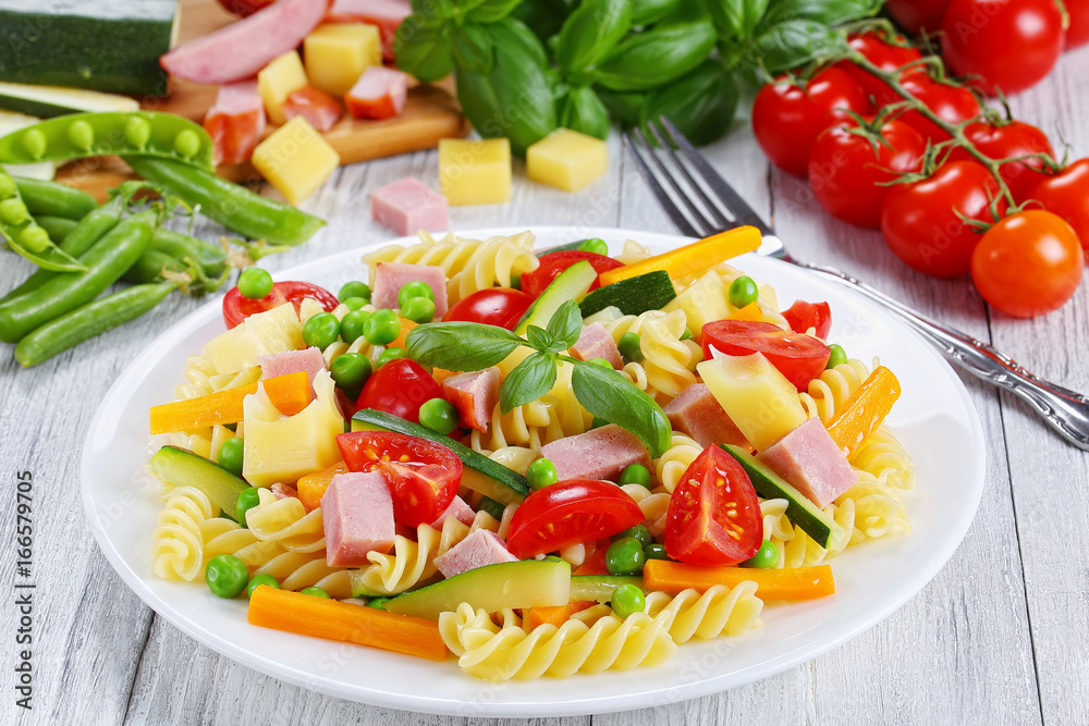 light healthy colorful salad of italian pasta