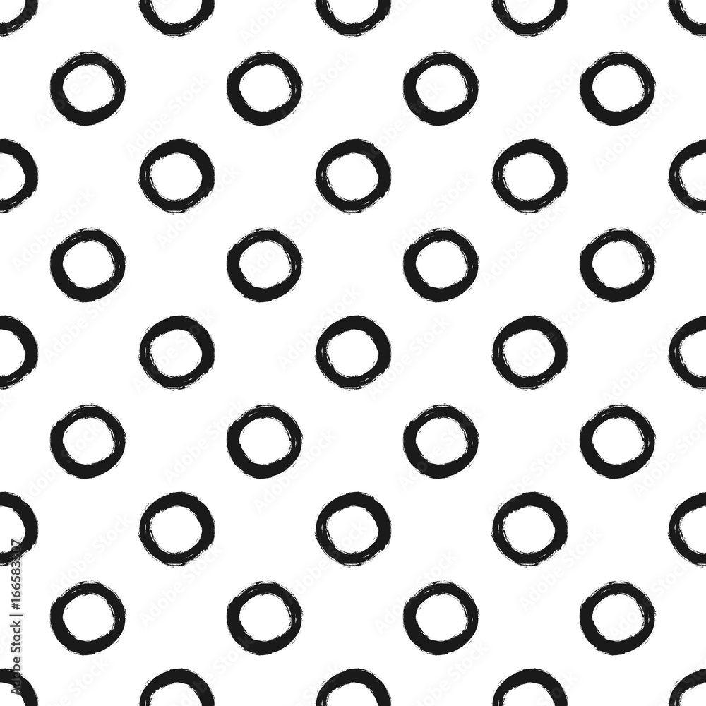 Repeated circles drawn with a rough brush. Trendy seamless pattern. Grunge, ink, sketch, watercolor, paint. Black round shape on a white background.