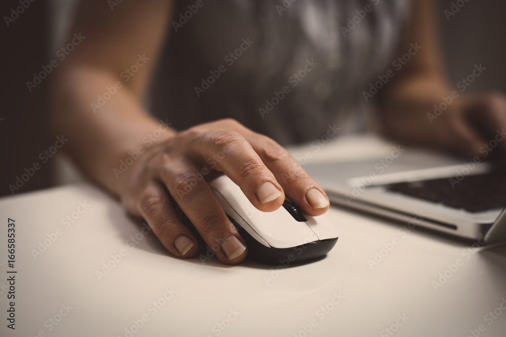Close up of hand using laptop. Caucasian business woman. Close up of hand using laptop. Caucasian business woman.