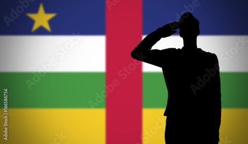 Silhouette of a soldier saluting against the central african republic flag