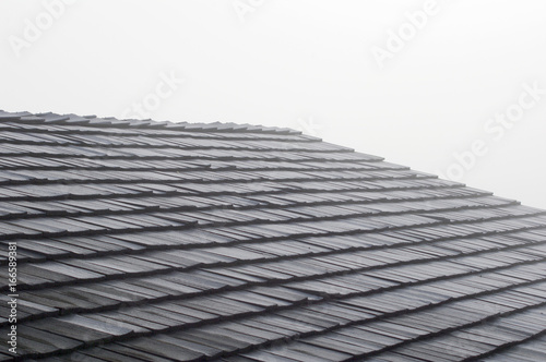 Shake shingles on roof with fog