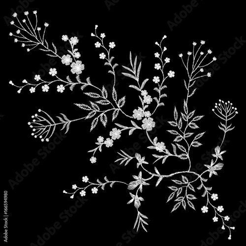 Embroidery white lace floral pattern small branches wild herb with little blue violet field flower. Ornate traditional folk fashion patch design neckline black background vector illustration
